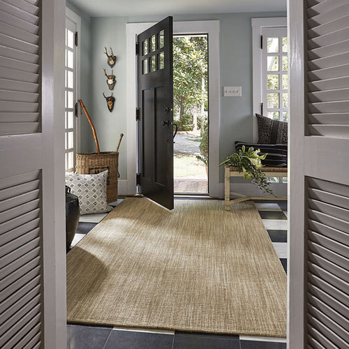 loomed rug in entryway 