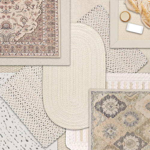 white and ivory collection of layered rugs 