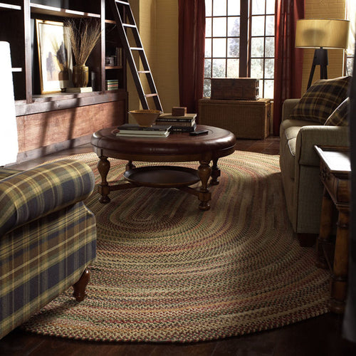 braided oval rug in lodge style living room 