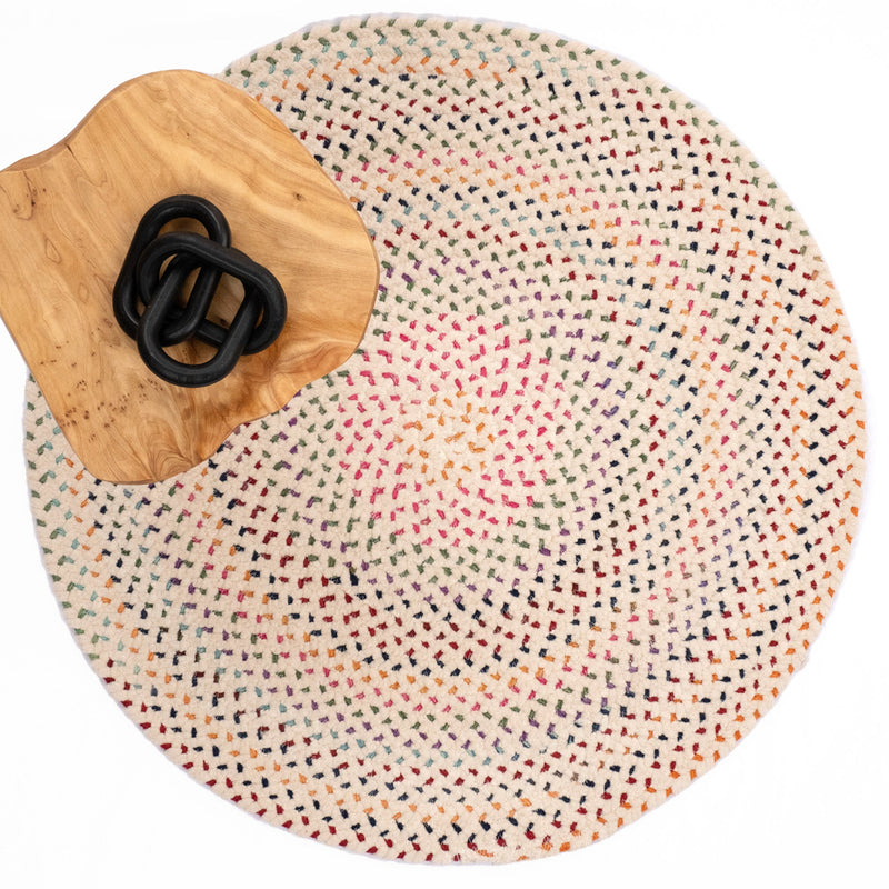 Dramatic Static Carnival Braided Rug Round Roomshot image