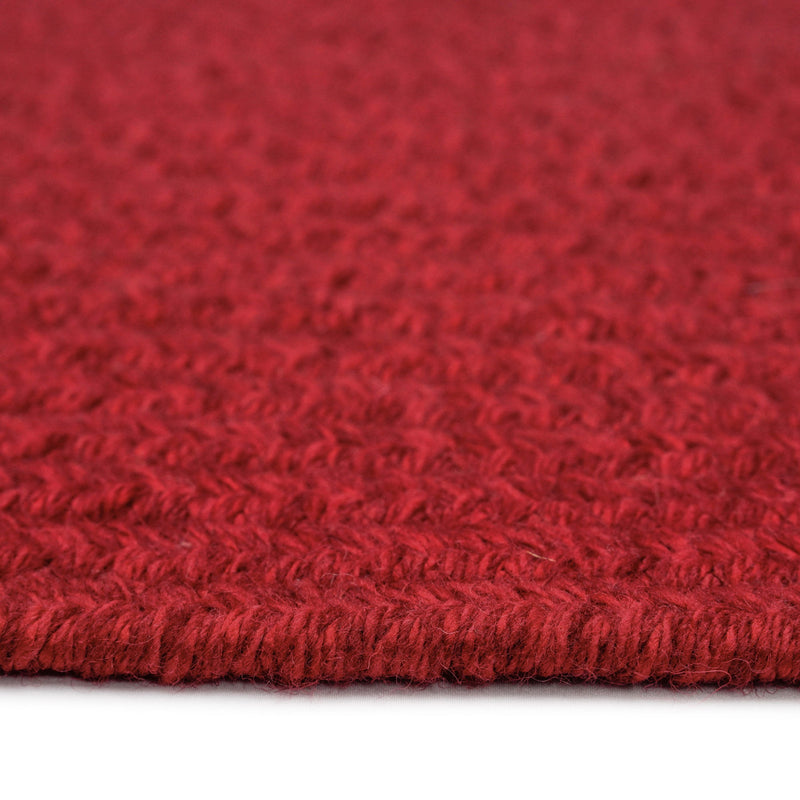 Heathered Scarlet Red Solid Braided Rug Oval Cross Section image