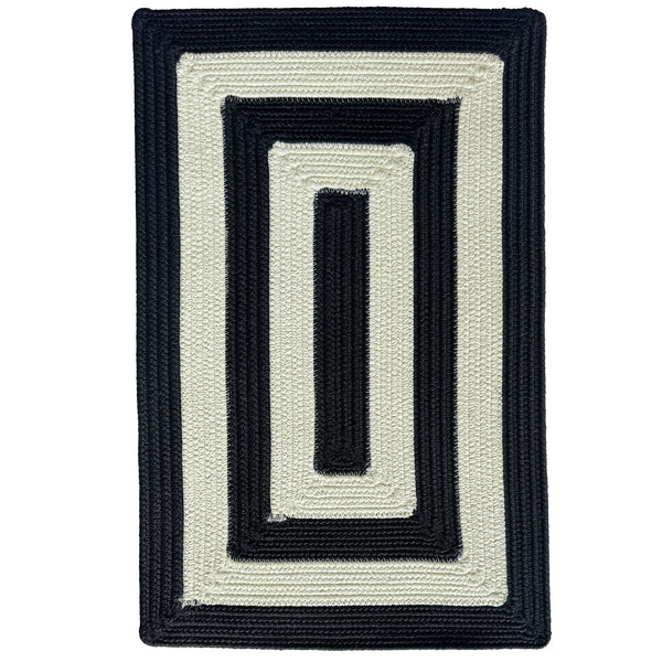 Timeless Black Braided Rug Concentric image