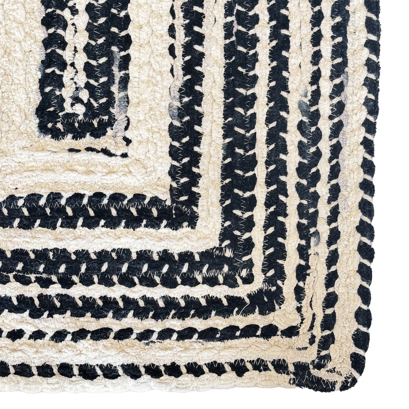 Crafted Black White Braided Rug Concentric Corner image