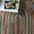 New Homestead Multi Braided Rug Oval Roomshot image