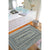 Bonneville Denim Braided Rug Concentric Roomshot image